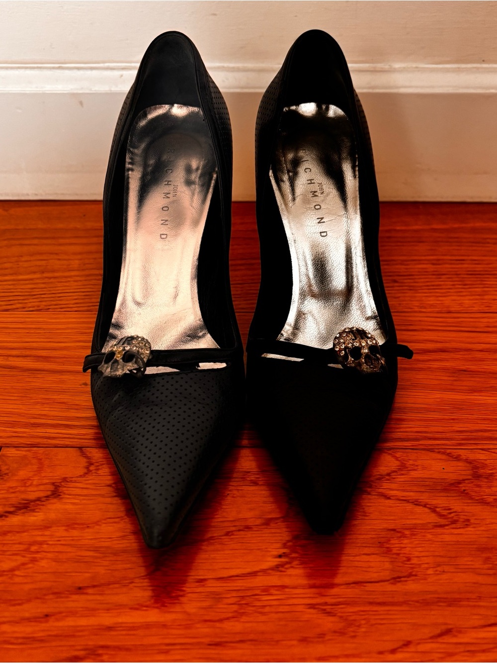 John Richmond Black Pointed Toe Pumps with Skull Accent